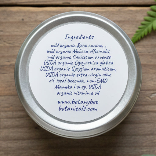 Close-up of a container lid with ingredient list on a brown background