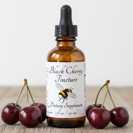Label of Black Cherry Tincture dietary supplement with bee illustration and text.