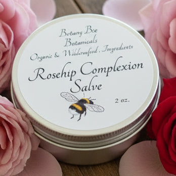 Rosehip Complexion Salve container with label on a wooden surface