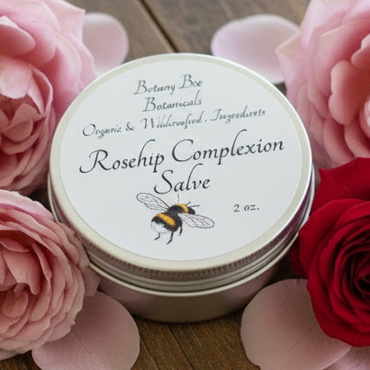 Rosehip Complexion Salve container with label on a wooden surface