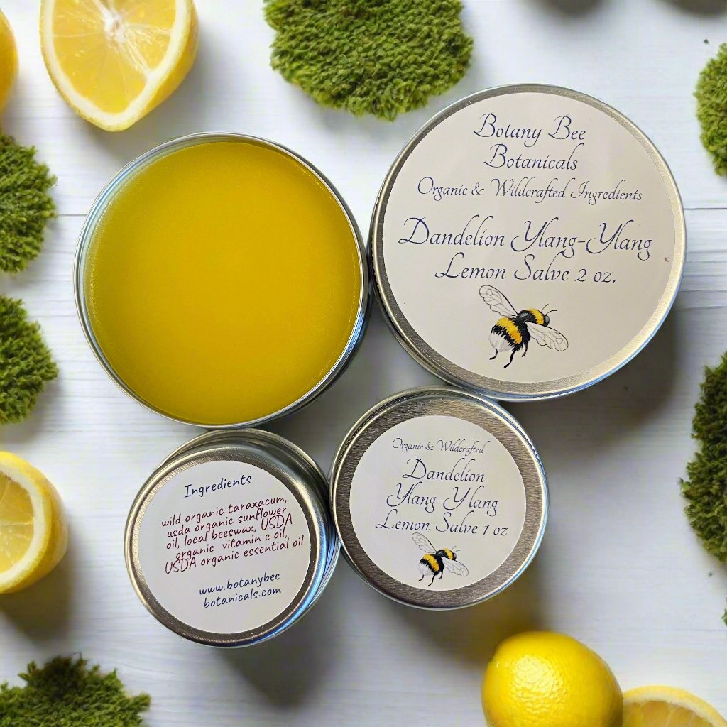 Tins of Organic Dandelion Ylang-Ylang Lemon Salve